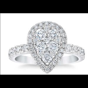 Brand new Diamond pear shaped white gold ring.